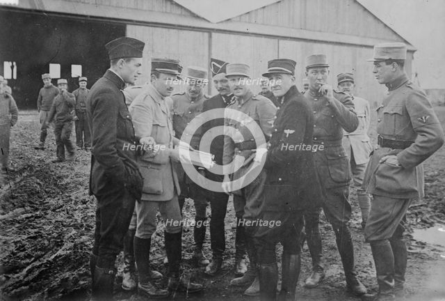 1. K. Rockwell, 2. Capt. Thenault, 3. Norman Prince, 4. Lieut. DeLaage, 5. Sgt. E, Cowdin..., 1916. Creator: Bain News Service.
