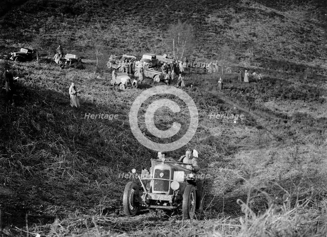 1089 cc Riley taking part in a motoring trial, late 1930s. Artist: Bill Brunell.