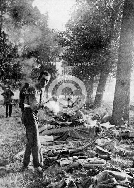 11th Hussars bivouacked at Champs after the retreat from Mons, September 1914 (1935). Artist: Unknown