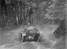 1496 cc Singer competing in the B&HMC Brighton-Beer Trial, Fingle Bridge Hill, Devon, 1934. Artist: Bill Brunell