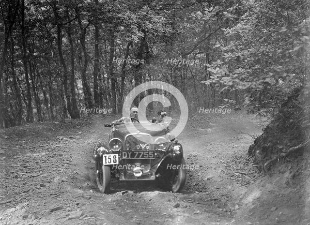 1496 cc Singer competing in the B&HMC Brighton-Beer Trial, Fingle Bridge Hill, Devon, 1934. Artist: Bill Brunell.
