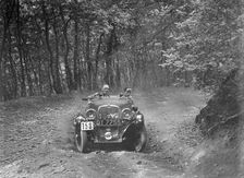 1496 cc Singer competing in the B&HMC Brighton-Beer Trial, Fingle Bridge Hill, Devon, 1934. Artist: Bill Brunell