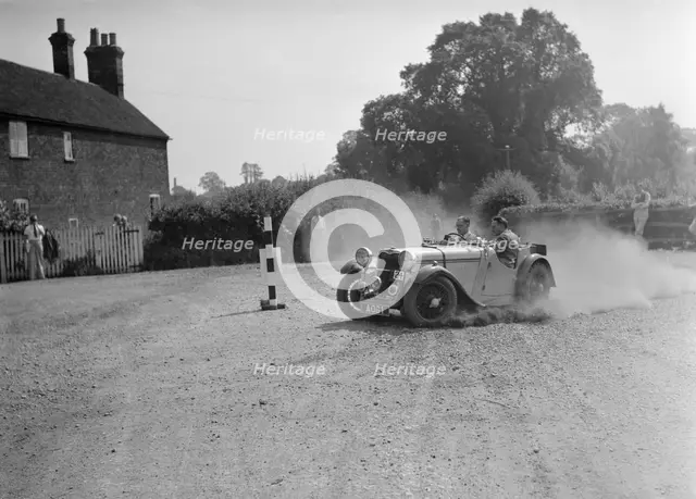 1496 cc Singer competing in the Singer CC Rushmere Hill Climb, Shropshire 1935. Artist: Bill Brunell.