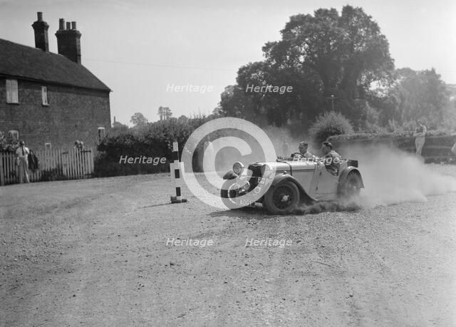 1496 cc Singer competing in the Singer CC Rushmere Hill Climb, Shropshire 1935. Artist: Bill Brunell.