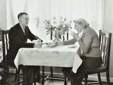 16 Candy Street, Poplar, London: elderly couple in a new flat, 1962. Creator: Unknown