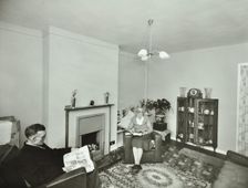 16 Candy Street, Poplar, London: elderly couple in a new flat, 1962. Creator: Unknown