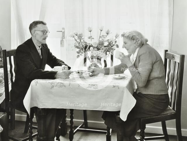 16 Candy Street, Poplar, London: elderly couple in a new flat, 1962. Creator: Unknown.