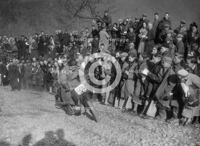 172 cc SOS of RWH Hole competing in the MCC Lands End Trial, Beggars Roost, Devon, 1936. Artist: Bill Brunell.