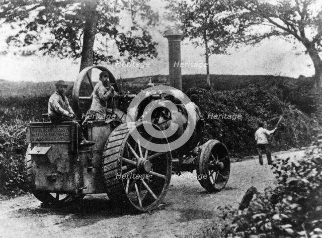 1869 Tasker traction engine with red flag man at the front