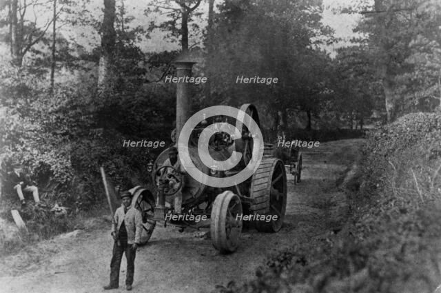 1869 Tasker traction engine with red flag man at the front
