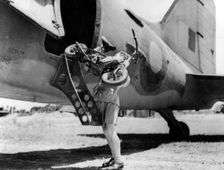 1944 Welbike being placed on to military transport plane. Creator: Unknown