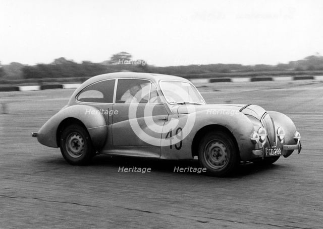 1947 Healey Elliott 2.4, E.B Wadworth at Silverstone 1956. Creator: Unknown.
