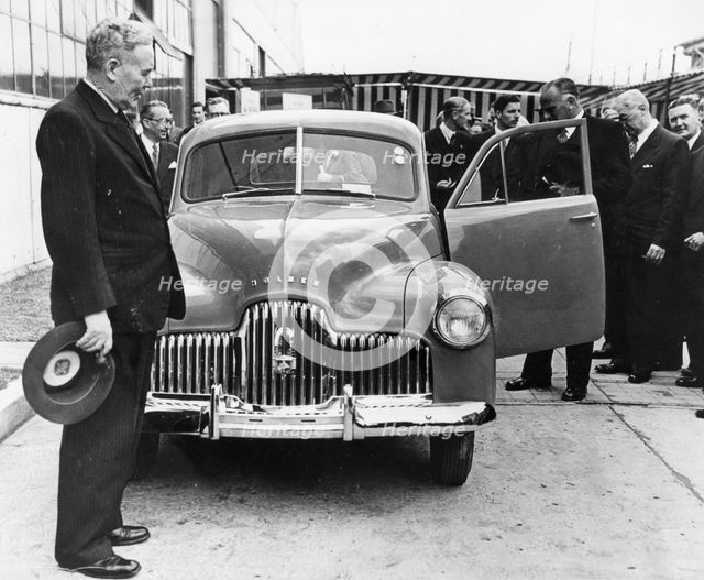 1948 Holden 48-215 with Australian Prime Minister J.B. Chifley. Creator: Unknown.