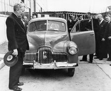 1948 Holden 48-215 with Australian Prime Minister J.B. Chifley. Creator: Unknown