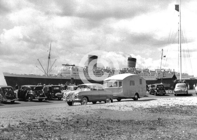1952 Ford Zephyr towing Winchester Pipit caravan Queen Elizabeth in B/g.. Creator: Unknown.