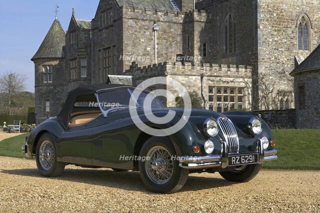 1954 Jaguar XK140 outside Palace House, Beaulieu Artist: Unknown.