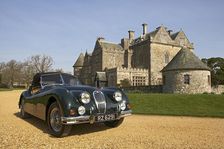 1954 Jaguar XK140 outside Palace House, Beaulieu