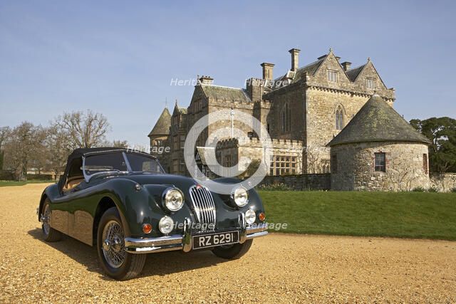 1954 Jaguar XK140 outside Palace House, Beaulieu Artist: Unknown.