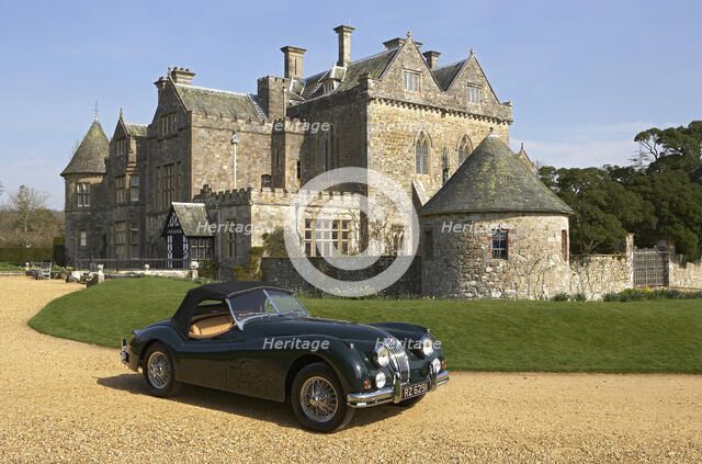 1954 Jaguar XK140 outside Palace House, Beaulieu Artist: Unknown.