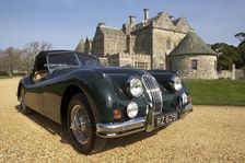 1954 Jaguar XK140 outside Palace House, Beaulieu