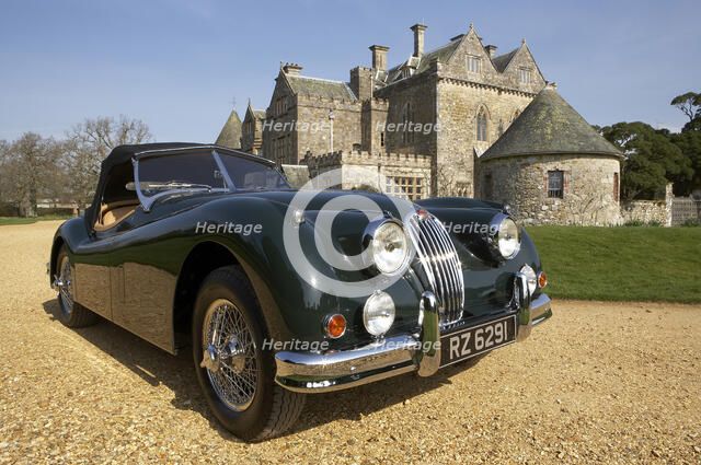 1954 Jaguar XK140 outside Palace House, Beaulieu Artist: Unknown.