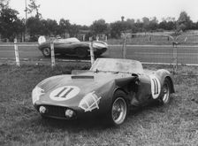 1955 Le Mans, Hawthorn's Jaguar D type passes de Portago's stricken Ferrari. Creator: Unknown