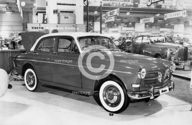 1956 Volvo 120 Amazon at motor show. Creator: Unknown.