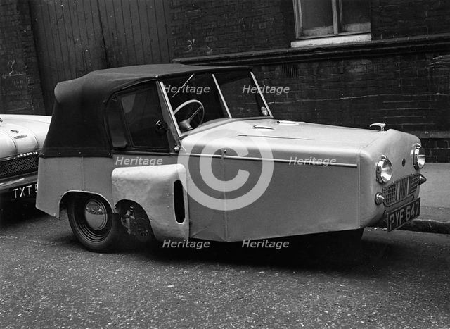 1956 Gordon 3 wheeler parked in street. Creator: Unknown.