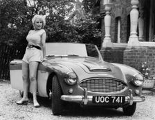 1957 Austin - Healey 100-6 with model. Creator: Unknown