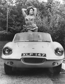 1959 Elva with posing female model. Creator: Unknown