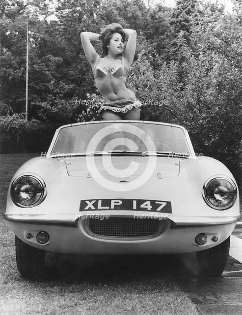1959 Elva with posing female model. Creator: Unknown.