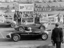 1959 Stirling Moss in Cooper Borgward, next to Graham Hill in Lotus Climax. Creator: Unknown