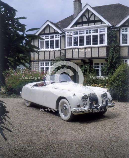 1960 Jaguar XK 150. Artist: Unknown