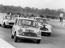 1961 Austin Mini driven by J. Gibson at Silverstone. Creator: Unknown