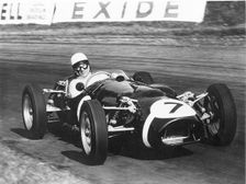 1961 Ferguson P99, Stirling Moss at Oulton Park Gold Cup. Creator: Unknown