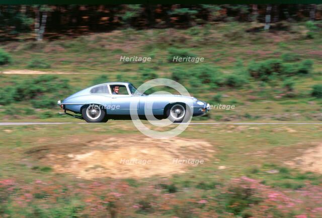 1965 Jaguar E type with smiling driver. Artist: Unknown.