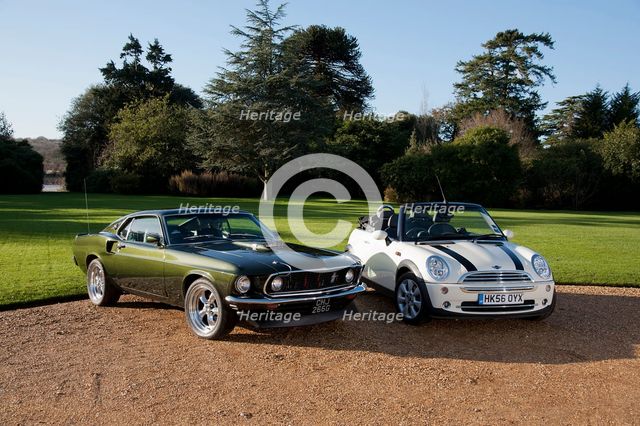 1968 Ford Mustang with 2006 Mini Cooper convertible. Creator: Unknown.