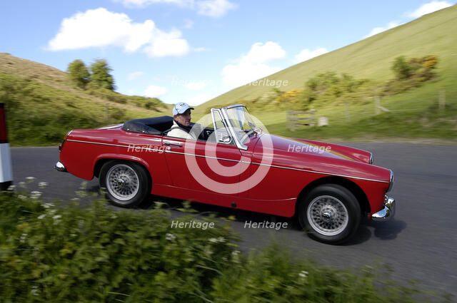 1969 MG Midget Artist: Unknown.