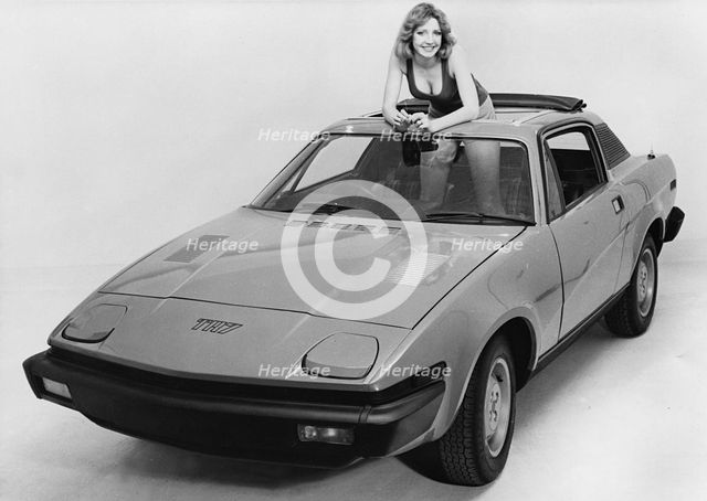 1976 Triumph TR7 with female model. Creator: Unknown.