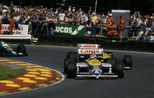 1986 British Grand Prix Ricardo Patrese leads Nigel Mansell in Williams FW11 at Brands Hatch. Creator: Unknown