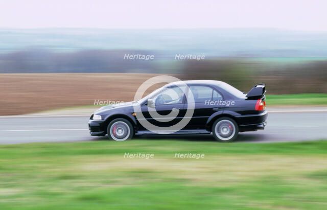 199 Mitsubishi Evo. Artist: Unknown.