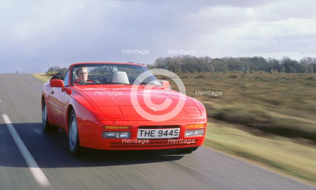 1990 Porsche 944 cabriolet driving along. Artist: Unknown.