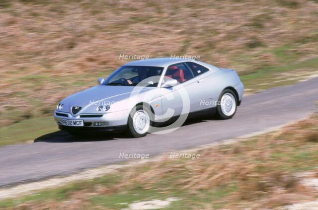 1998 Alfa Romeo GTV twin spark. Artist: Unknown.