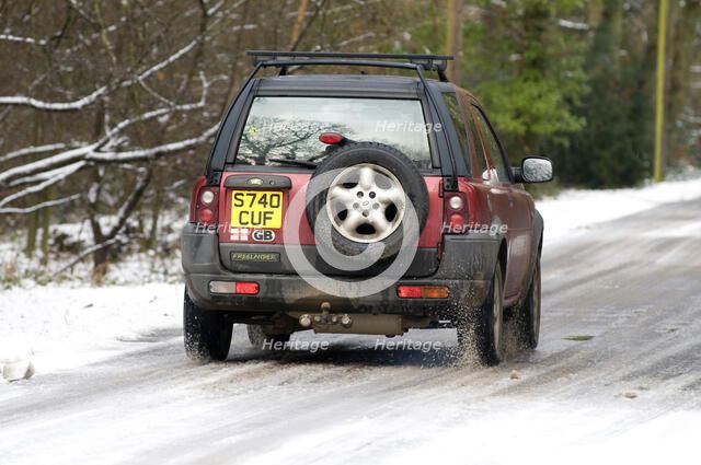 1998 Land Rover Freelander driving on icy road 2009 Artist: Unknown.