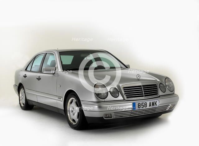 1998 Mercedes Benz E240 Artist: Unknown.