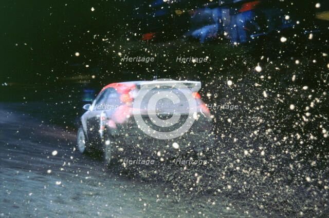 1999 Ford Focus WRC, C.McRae. Network Q Rally with flying mud!. Artist: Unknown.