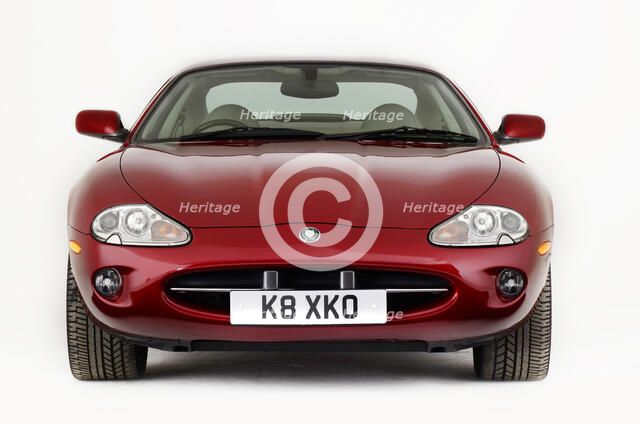1999 Jaguar XK8 coupe Artist: Unknown.
