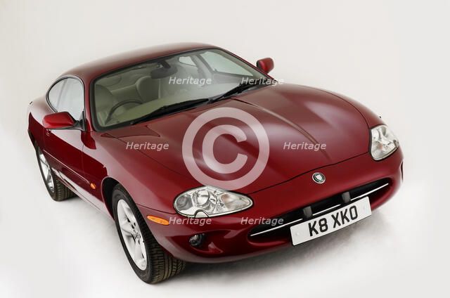 1999 Jaguar XK8 coupe Artist: Unknown.