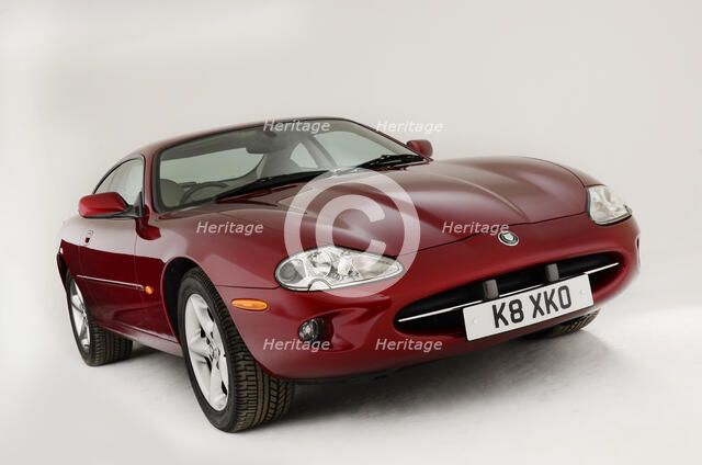 1999 Jaguar XK8 coupe Artist: Unknown.