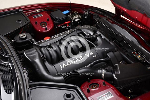 1999 Jaguar XK8 coupe Artist: Unknown.